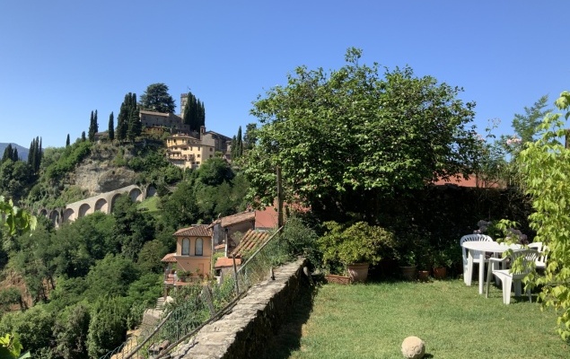 Village house with garden and views